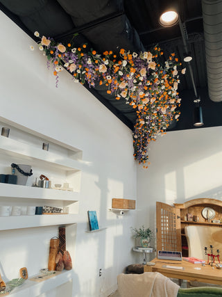 Faux florals designed into the ceiling of Salt Hill Gallery
