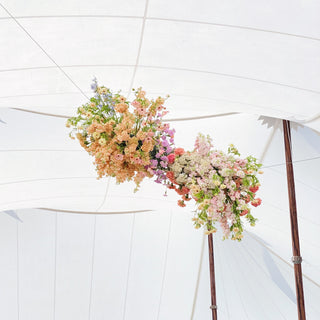A hanging floral statement at a wedding